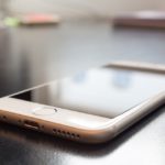 smartphone sitting on nightstand