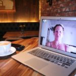 free screen sharing on apple iOS laptop on a table with coffee
