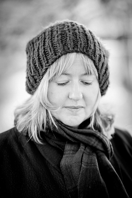 black and white picture of non profit owner janet in wool cap and scarf