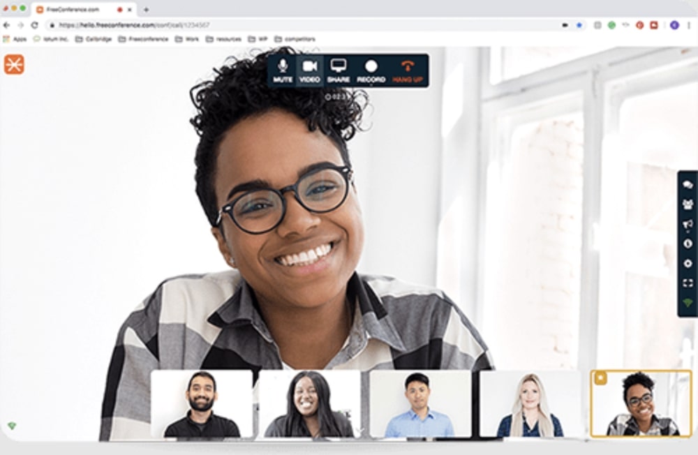 Close up view of smiling woman as speaker and 5 thumbnails of other speakers in Gallery View